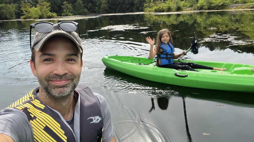 Web Designer Brandon Crabtree in Indiana, Kayaking with his oldest daughter.